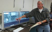 Dr. Larry Krissek (The Ohio State University) in front of Corelyzer