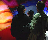 The C-Wall and a 2000 lumen projector CAVE on display at the EVL Open House for IEEE VR 2004.