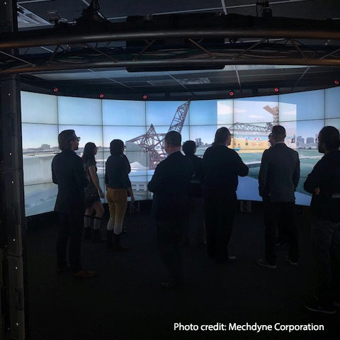 Mechdyne Corporation showing proposed Chicago riverwalk concept in the CAVE2 environment at the UIC Electronic Visualization Laboratory.