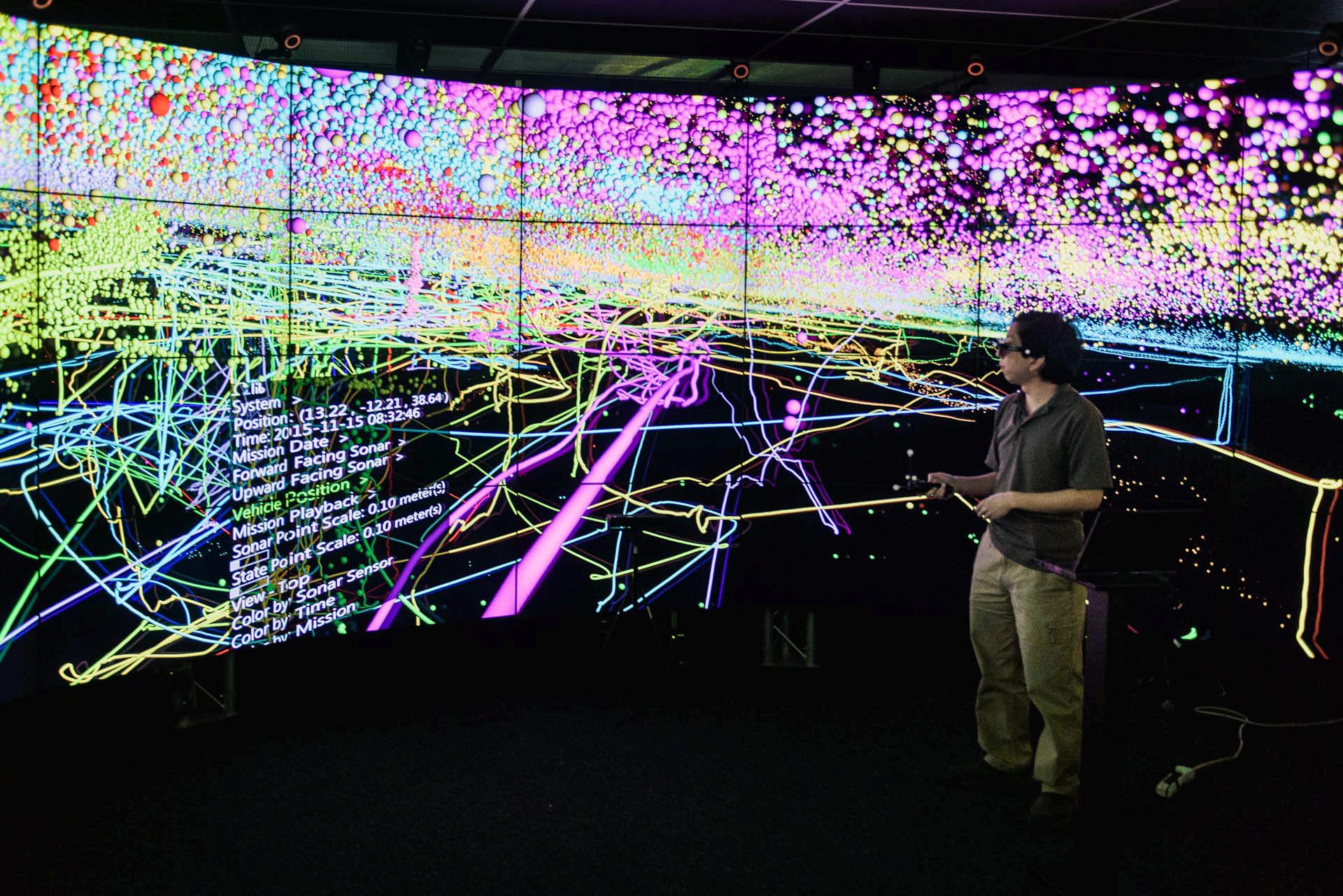 Arthur Nishimoto in EVL’s CAVE2 demonstrating the SIMPLE application.